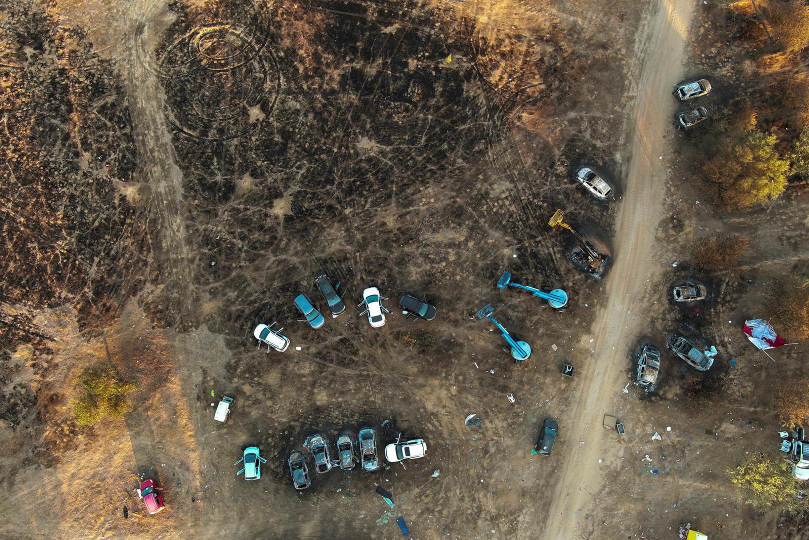 An aerial view shows the burnt cars of festival-goers at the site of an attack on the Nova Festival by Hamas gunmen from Gaza, near Israel's border with the Gaza Strip, in southern Israel, October 12, 2023. REUTERS/Ilan Rosenberg Photo: ILAN ROSENBERG/REUTERS