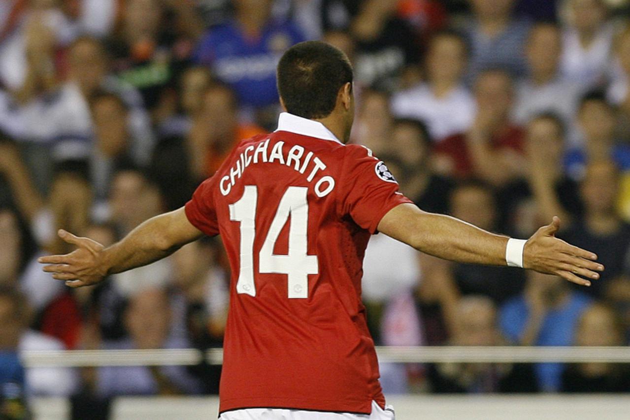 \'Manchester United\'s Javier Hernandez \'Chicharito\' celebrates after he scored against Valencia during their Champions League Group C soccer match at the Mestalla Stadium in Valencia, September 29,