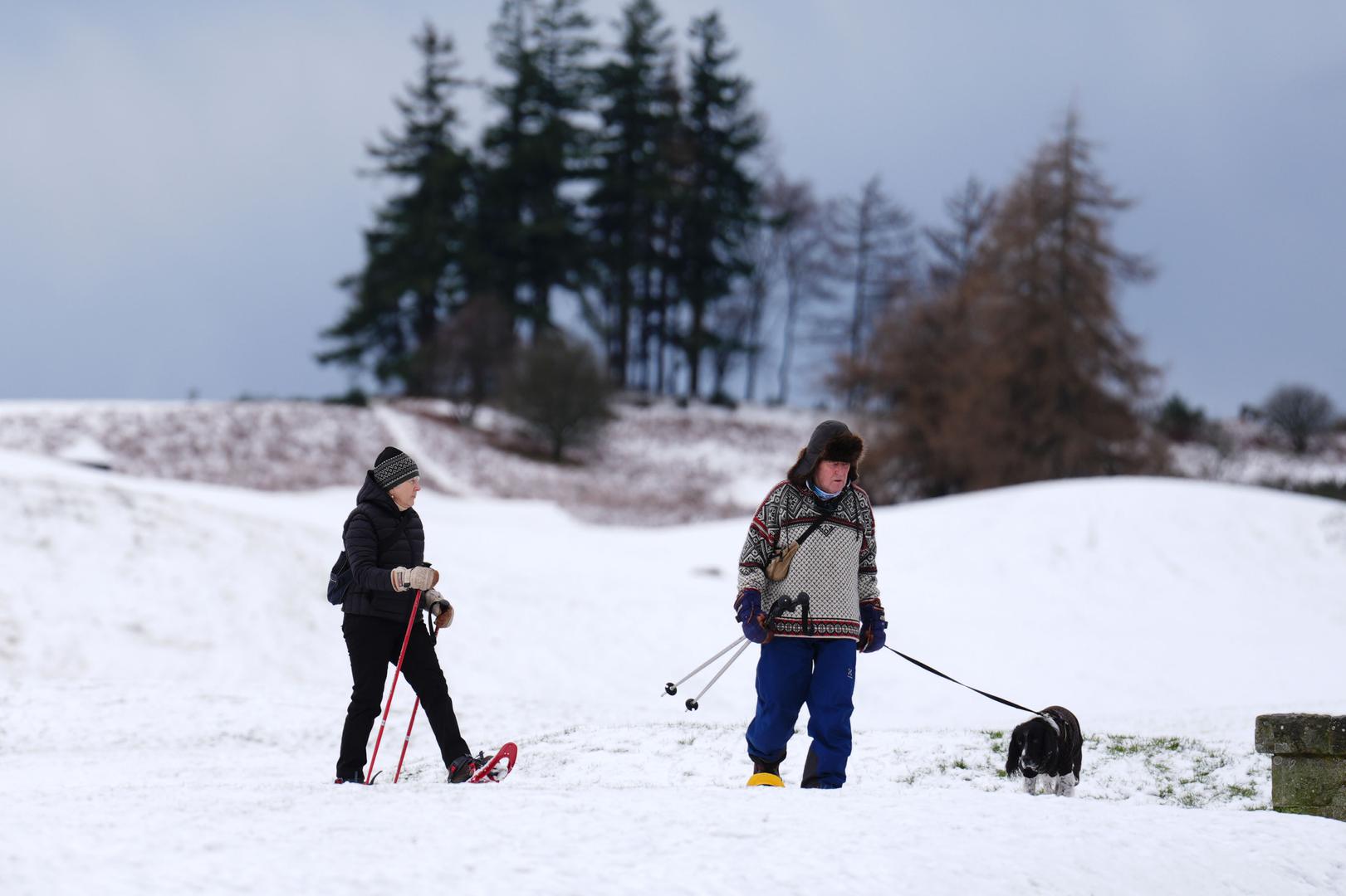 Walkers at Gleneagles in Perthshire. Weather warnings remain in force across much of the UK on Monday with adverse conditions, including flooding from heavy rain and thawing snow. Picture date: Monday January 6, 2025. Photo: Andrew Milligan/PRESS ASSOCIATION