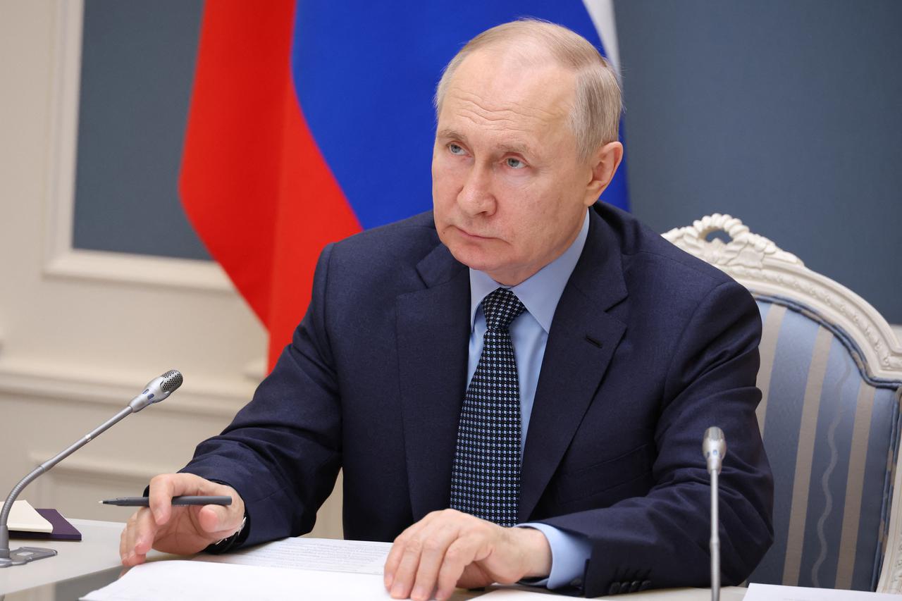 Russian President Vladimir Putin chairs a meeting in Moscow