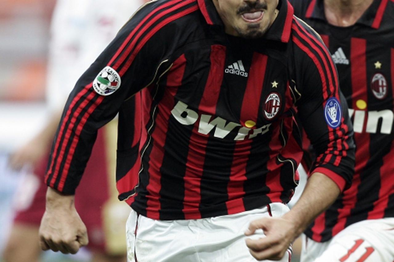 'AC Milan\'s Gennaro Gattuso celebrates his goal against Livorno during their Italian Serie A match at the San Siro Stadium in Milan, northern Italy, February 11, 2007. REUTERS/Daniele La Monaca (ITAL