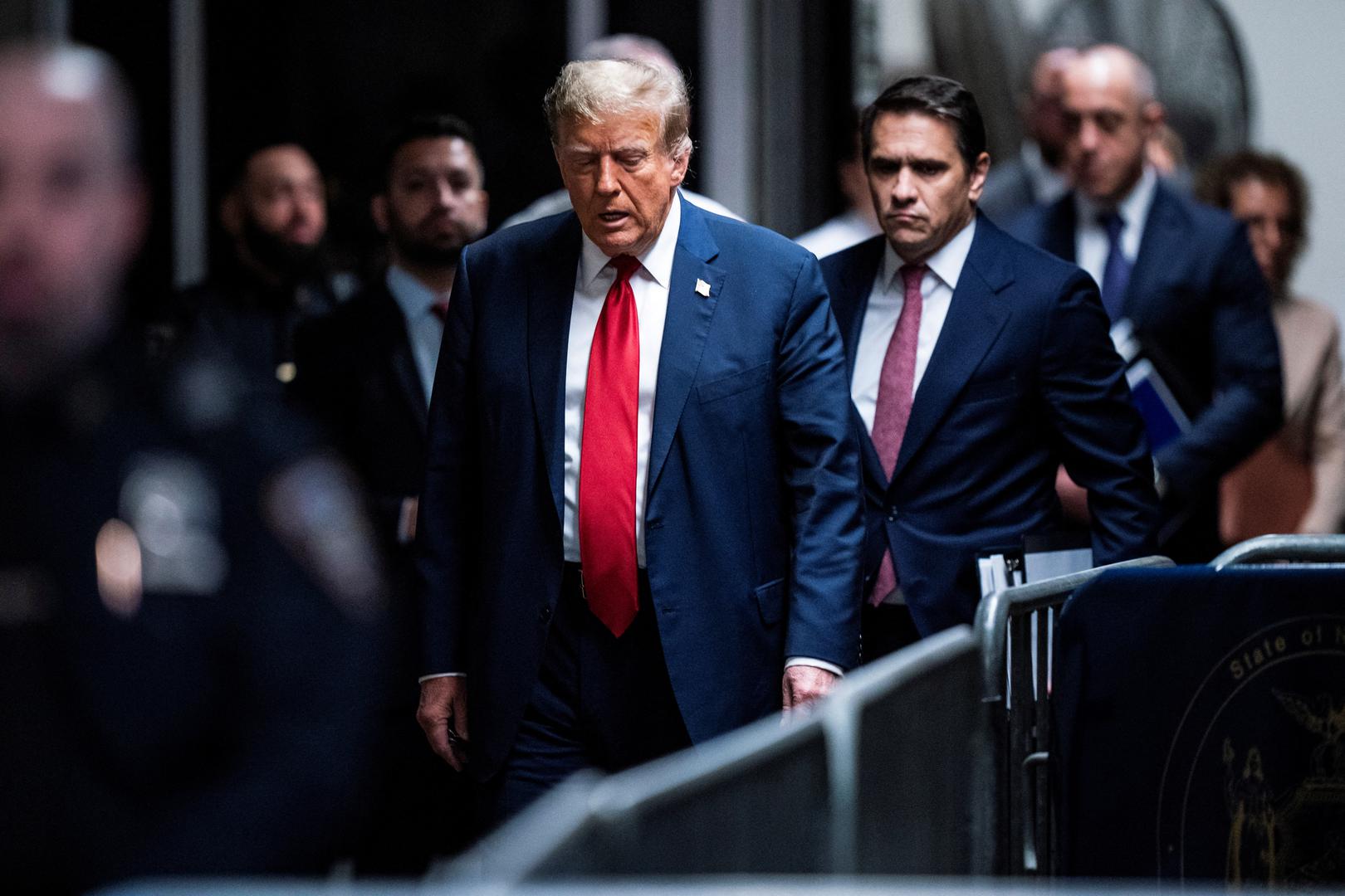 Former U.S. President Donald Trump arrives at Manhattan criminal court with his legal team ahead of the start of jury selection in New York, NY, U.S., on Monday, April 15, 2024. Trump faces 34 felony counts of falsifying business records as part of an alleged scheme to silence claims of extramarital sexual encounters during his 2016 presidential campaign.  Jabin Botsford/Pool via REUTERS Photo: Jabin Botsford/REUTERS