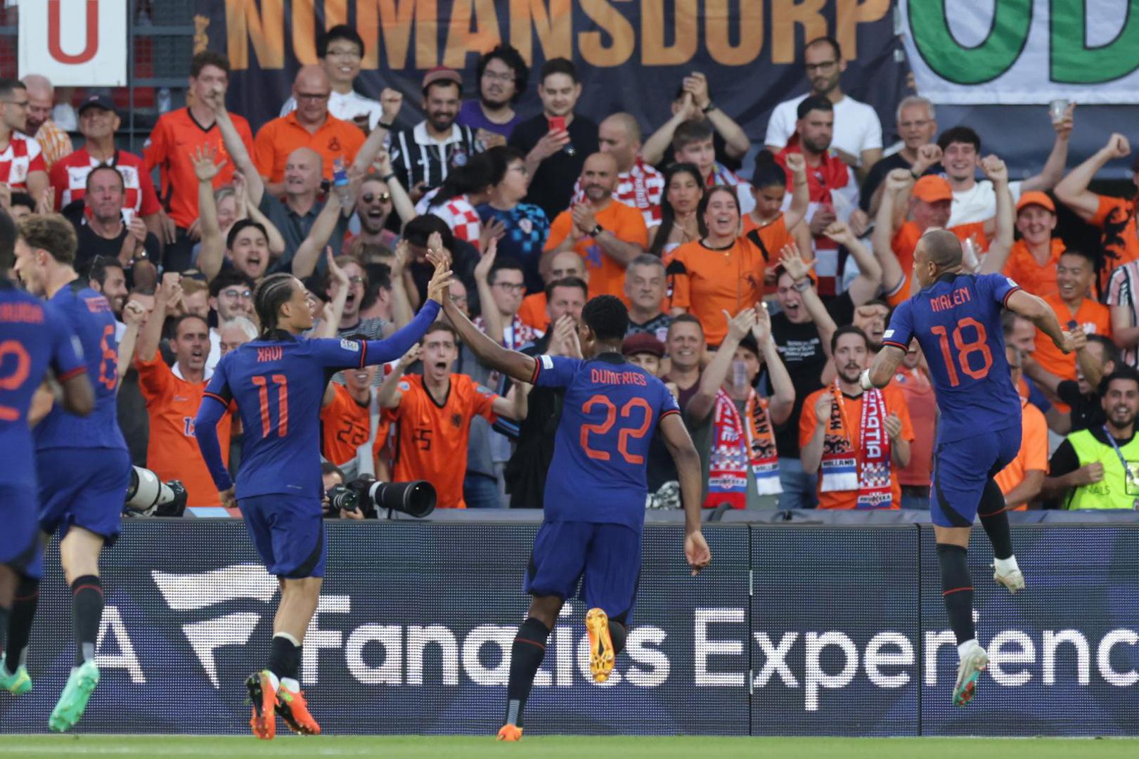 14.06.2023., stadion Feyenoord "De Kuip", Rotterdam, Nizozemska - UEFA Liga Nacija, polufinale, Nizozemska - Hrvatska. Nogometasi Nizozemske slave pogodak za 1:0. Photo: Luka Stanzl/PIXSELL