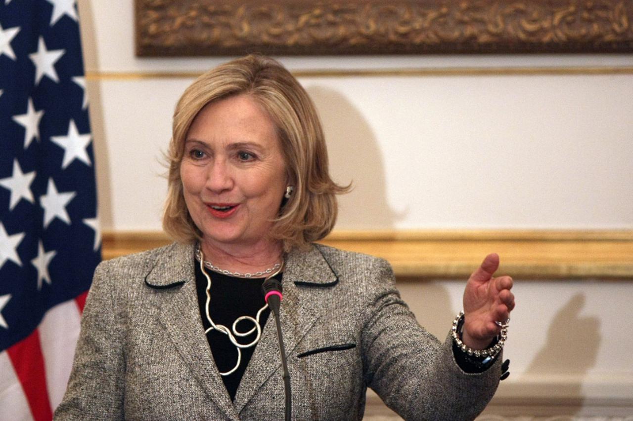 'US Secretary of State Hillary Clinton speaks as Egyptian Foreign Affairs Minister Nabil al-Arabi (unseen) listens on during a joint press briefing at the Egyptian foreign affair office in Cairo, Egyp