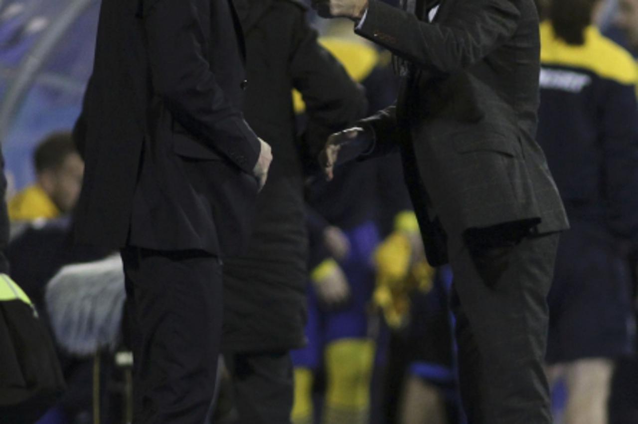 'Sweden\'s head coach Erik Hamren (R) shakes hands with Croatia\'s head coach Slaven Bilic after their friendly soccer match in Zagreb February 29, 2012.       REUTERS/Antonio Bronic (CROATIA  - Tags: