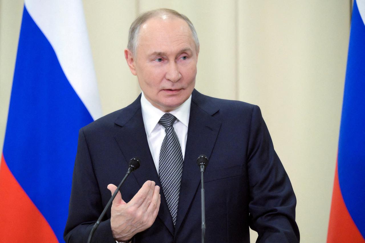 FILE PHOTO: Russian President Putin attends a press conference in Leningrad region