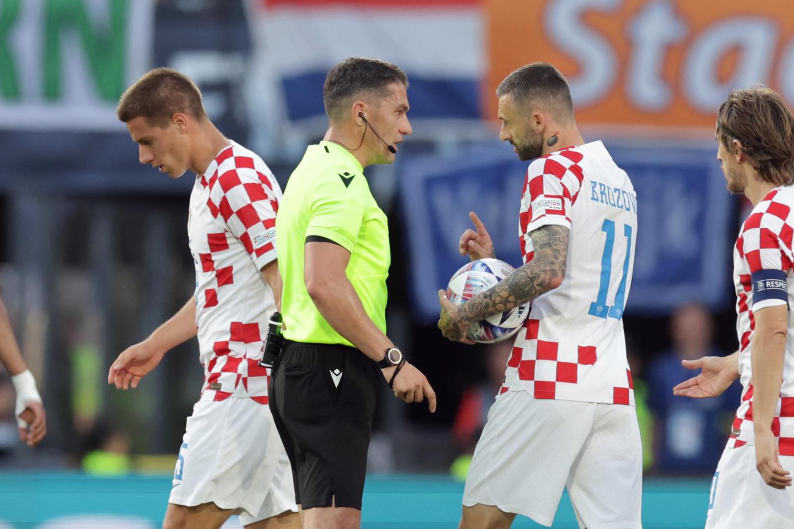 14.06.2023., stadion Feyenoord "De Kuip", Rotterdam, Nizozemska - UEFA Liga Nacija, polufinale, Nizozemska - Hrvatska. sudac Istvan Kovacs, Marcelo Brozovic Photo: Luka Stanzl/PIXSELL