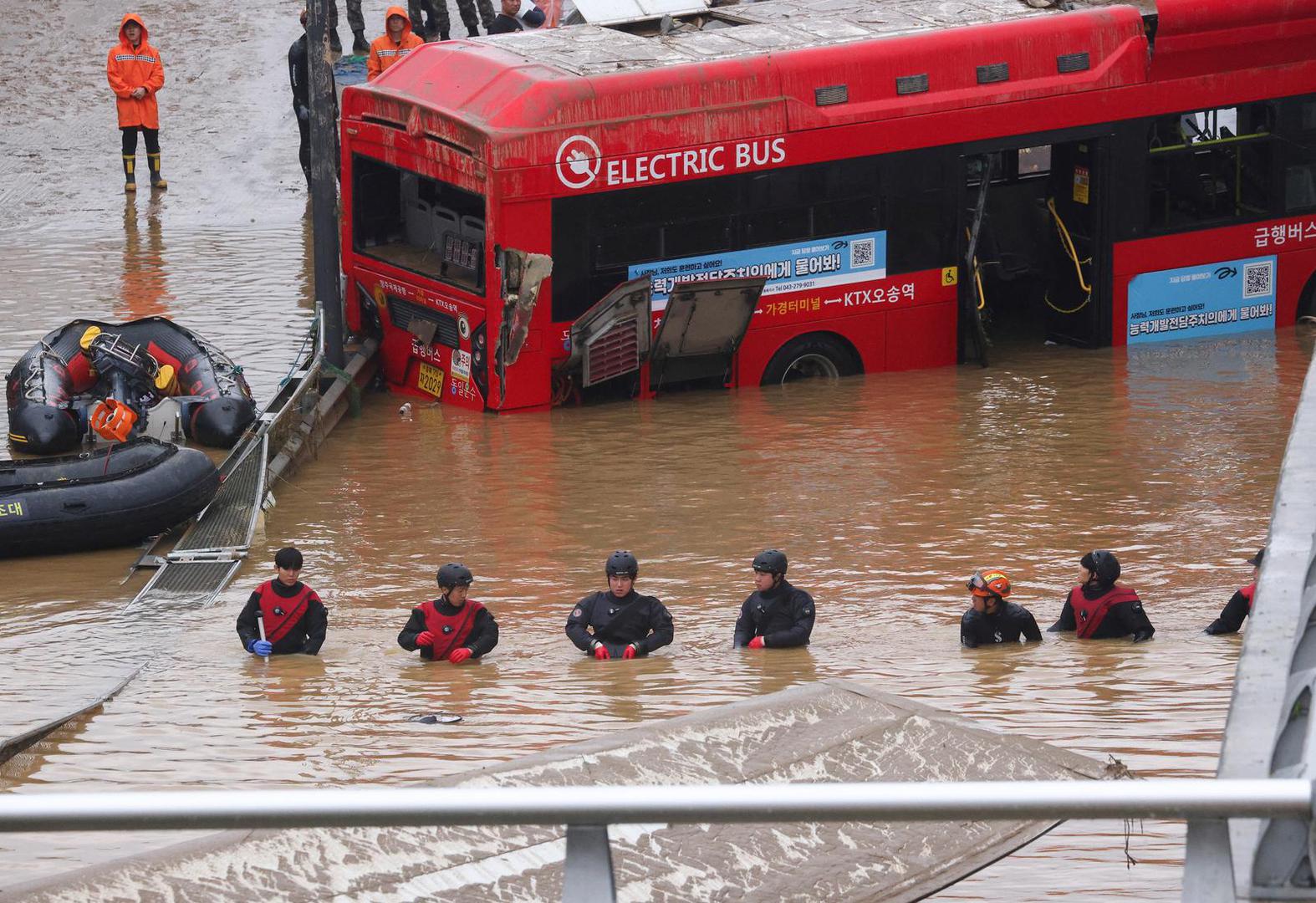 Rescue workers take part in a search and rescue operation near an underpass that has been submerged by a flooded river caused by torrential rain in Cheongju, South Korea, July 16, 2023.   REUTERS/Kim Hong-ji Photo: KIM HONG-JI/REUTERS