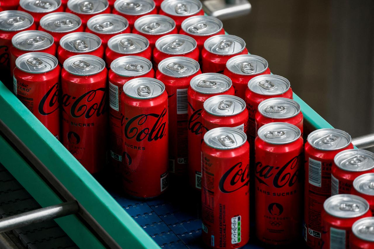 FILE PHOTO: Production line at the Coca-Cola Europacific Partners bottling plant in Les Pennes-Mirabeau, near Marseille