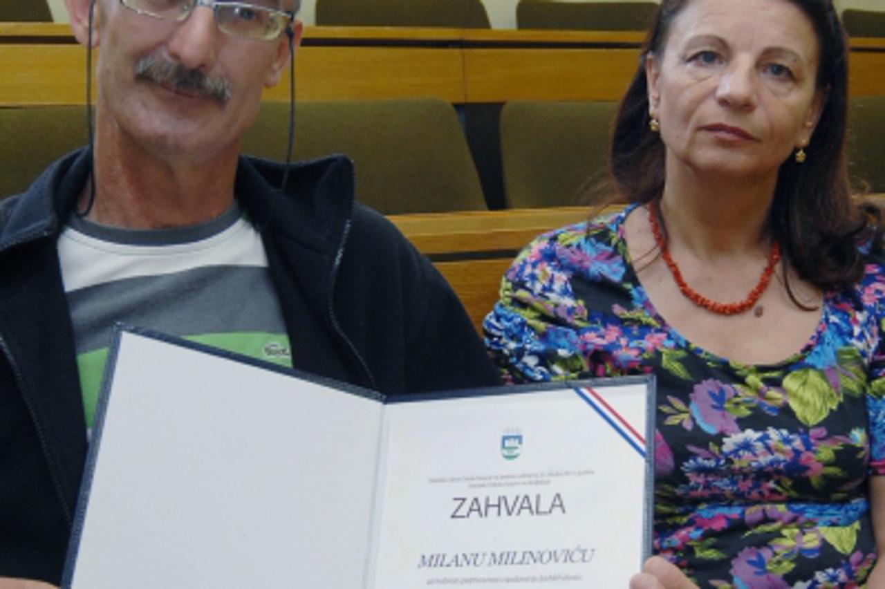 '16.05.2013., Sisak - Milan Milinovic dobio je Zahvalnicu Grada Siska za hrabrost prilikom spasavanja djeda i unuka iz gorucekuce u Hrastelnici 19.prosinca 2012.(ARHIVA) - za Regije Sisak. Photo: Niko