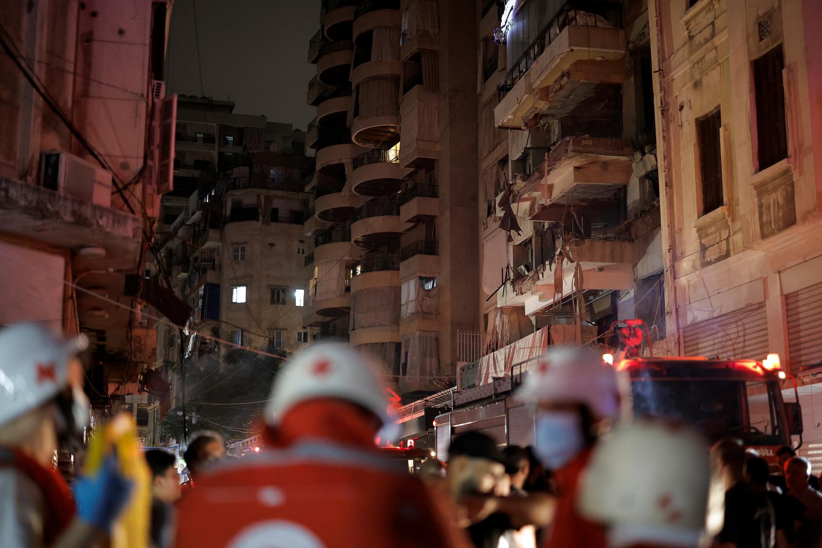 Members of the Red Cross stand near a damaged building at the site of an Israeli air strike, amid ongoing hostilities between Hezbollah and Israeli forces, in Ras Al- Nabaa, in Beirut, Lebanon, October 10, 2024. REUTERS/Louisa Gouliamaki Photo: LOUISA GOULIAMAKI/REUTERS