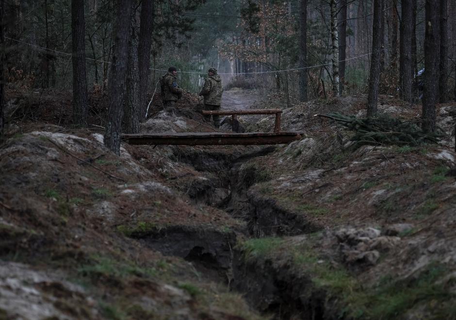 Ukrainian servicemen from the Volyn Territorial Defence brigade attend an exercise near the border with Belarus in Volyn region