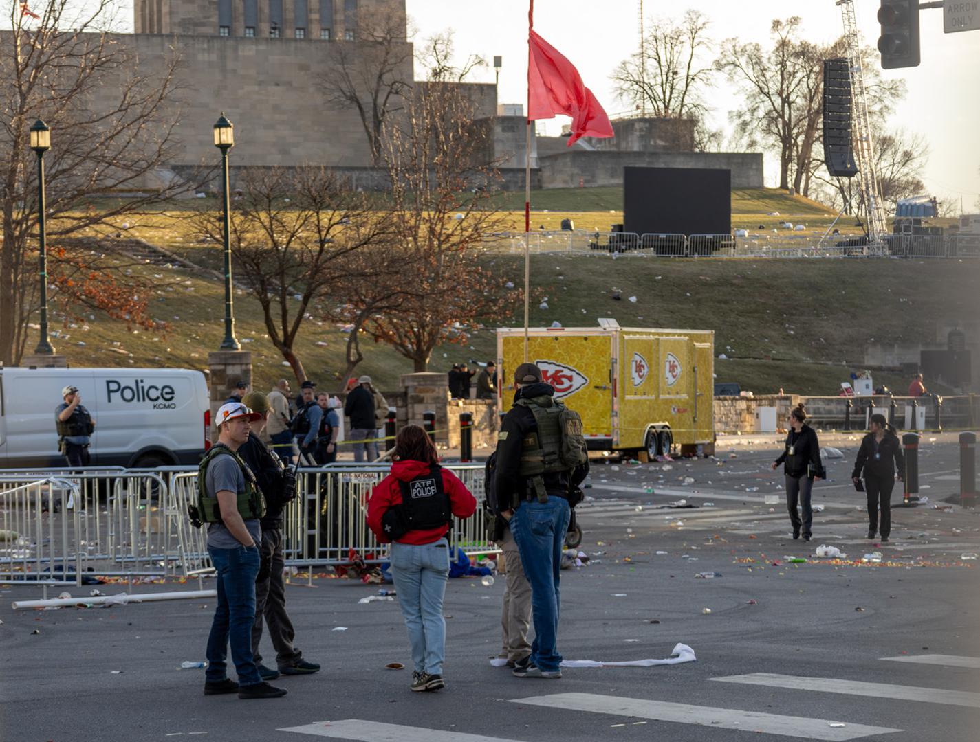 (240215) -- KANSAS CITY, Feb. 15, 2024 (Xinhua) -- Policemen work at the site following a shooting in Kansas City, Missouri, the United States, Feb. 14, 2024. At least one person was killed and 22 were injured as gunfire erupted during the Kansas City Chiefs' Super Bowl victory parade in Kansas City, U.S. state of Missouri, Stacey Graves, chief of the Kansas City Missouri Police Department, said at a news conference on Wednesday afternoon. (Photo by Robert Reed/Xinhua) Photo: Robert Reed/XINHUA