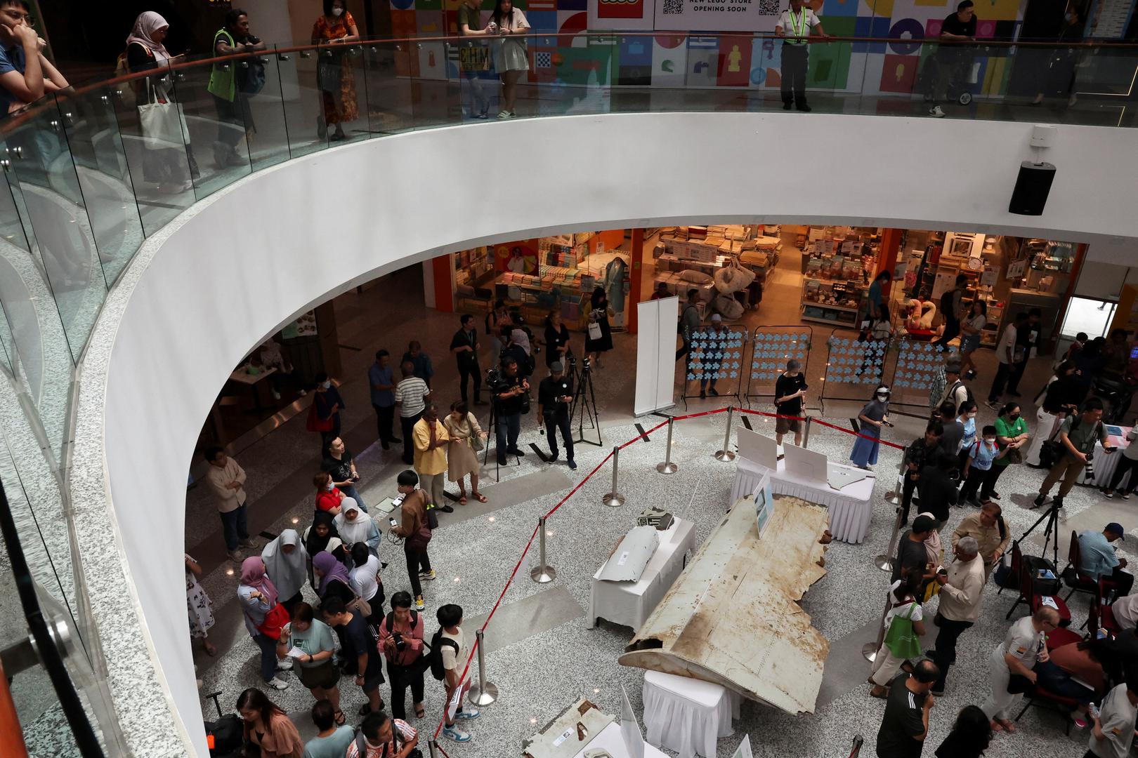 Visitors look at the wreckage of an aircraft believed to be from the missing Malaysia Airlines flight MH370 during a remembrance event marking the 10th anniversary of its disappearance, in Subang Jaya, Malaysia March 3, 2024. REUTERS/Hasnoor Hussain Photo: HASNOOR HUSSAIN/REUTERS