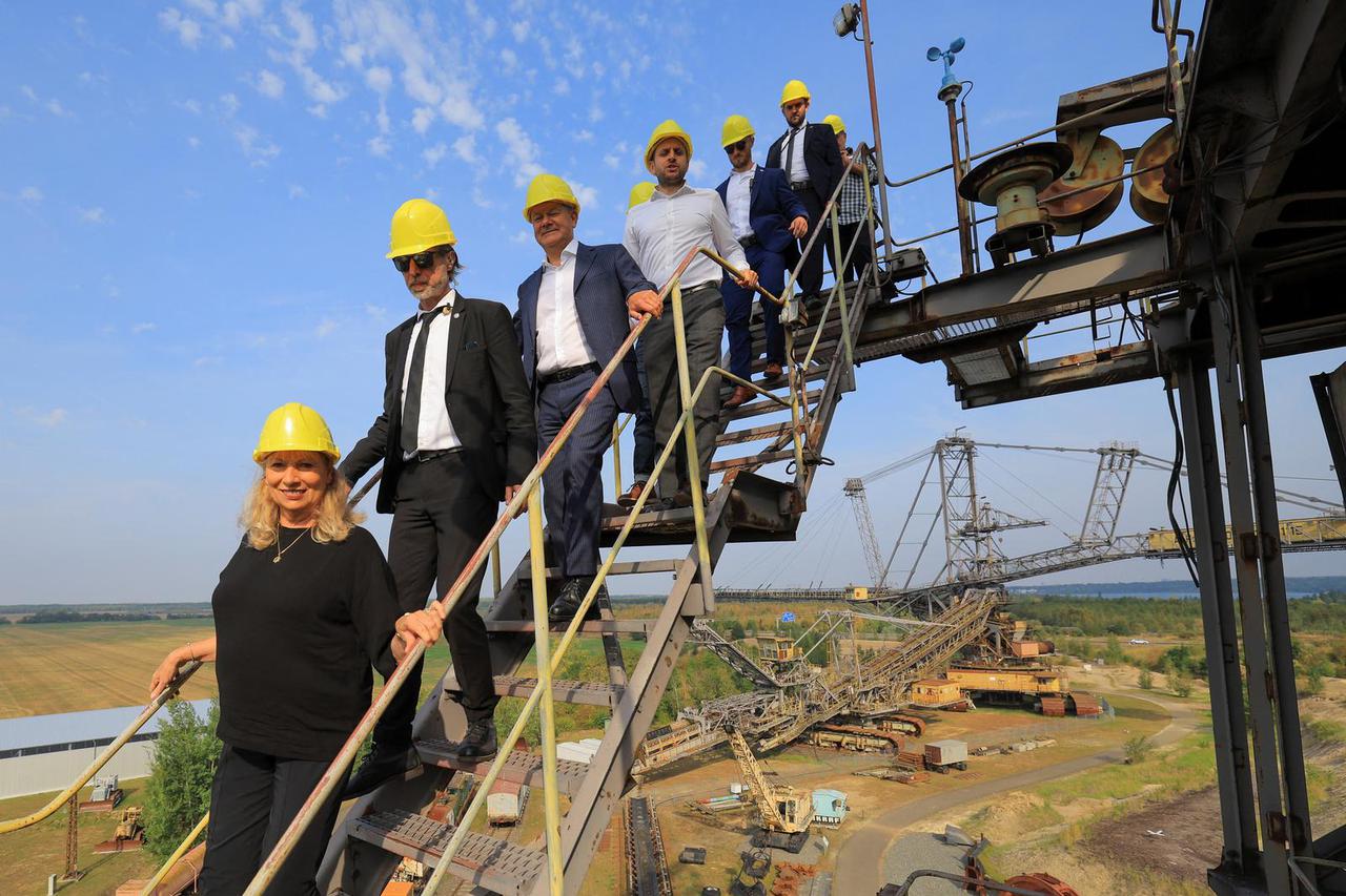 German Chancellor Scholz and Petra Koepping of SPD visit an old lignite excavator at the Mining Technology Park and the recultivation of lignite mining in Grosspoesna