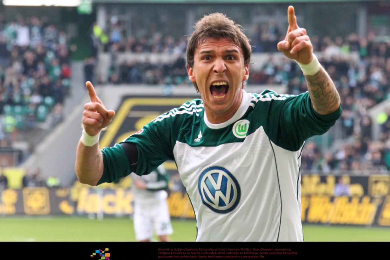 \'12.03.2011, Volkswagen Arena, Wolfsburg, GER, 1.FBL,  VfL Wolfsburg vs 1. FC Nuernberg, im Bild Mario Mandzukic #18 vom VfL Wolfsburg jubelt nach seinem 1:0 Kopfballtor.   Foto Ÿ nph / Rust\'