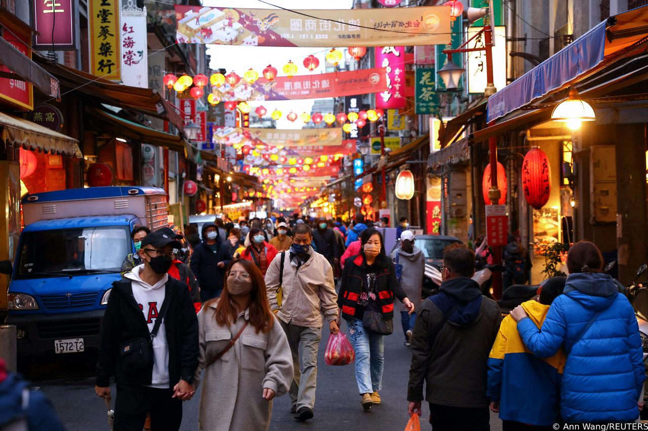 People shop to celebrate the upcoming Lunar new year in Taipei