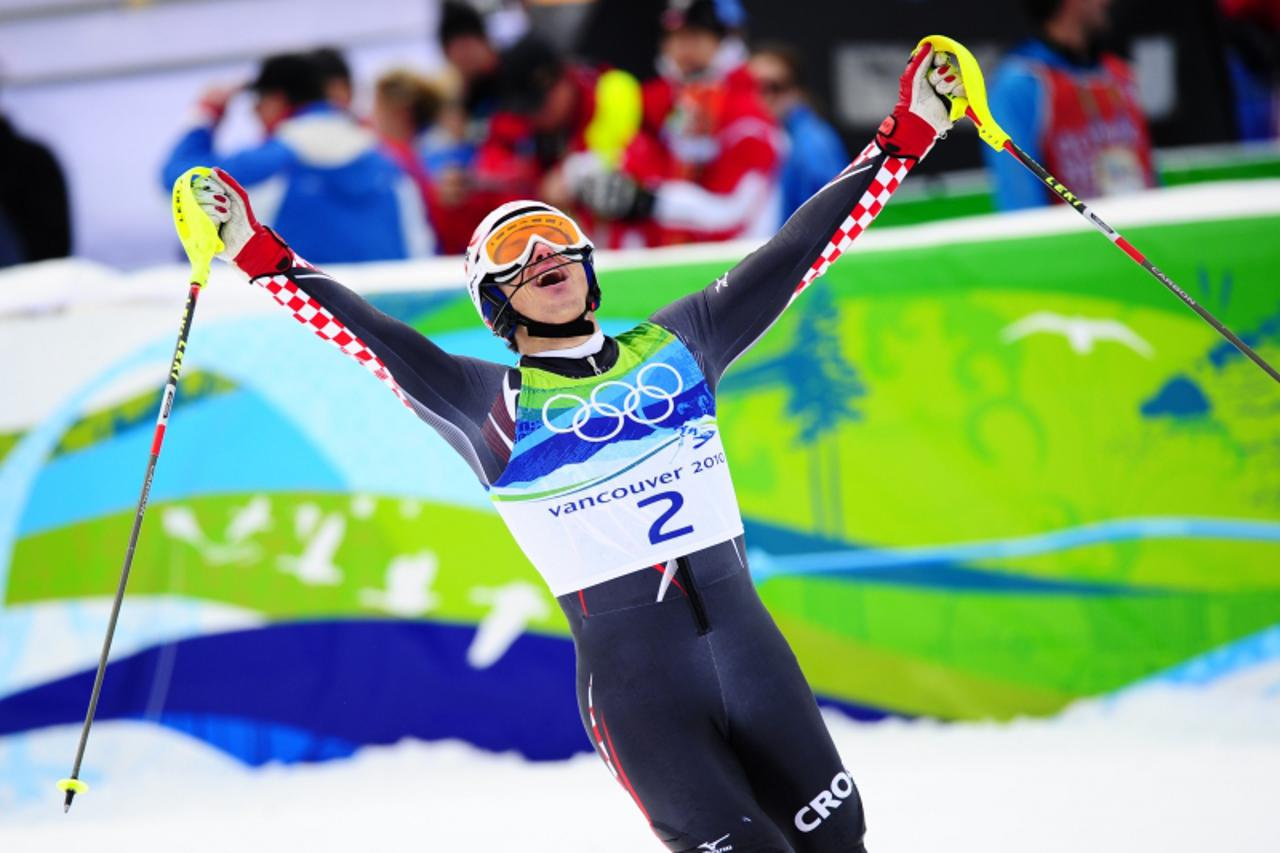 'Croatia\'s Ivica Kostelic celebrates  in the finish area during the Men\'s Vancouver 2010 Winter Olympics Slalom event at Whistler Creek side Alpine skiing venue on February 27, 2010.           AFP P