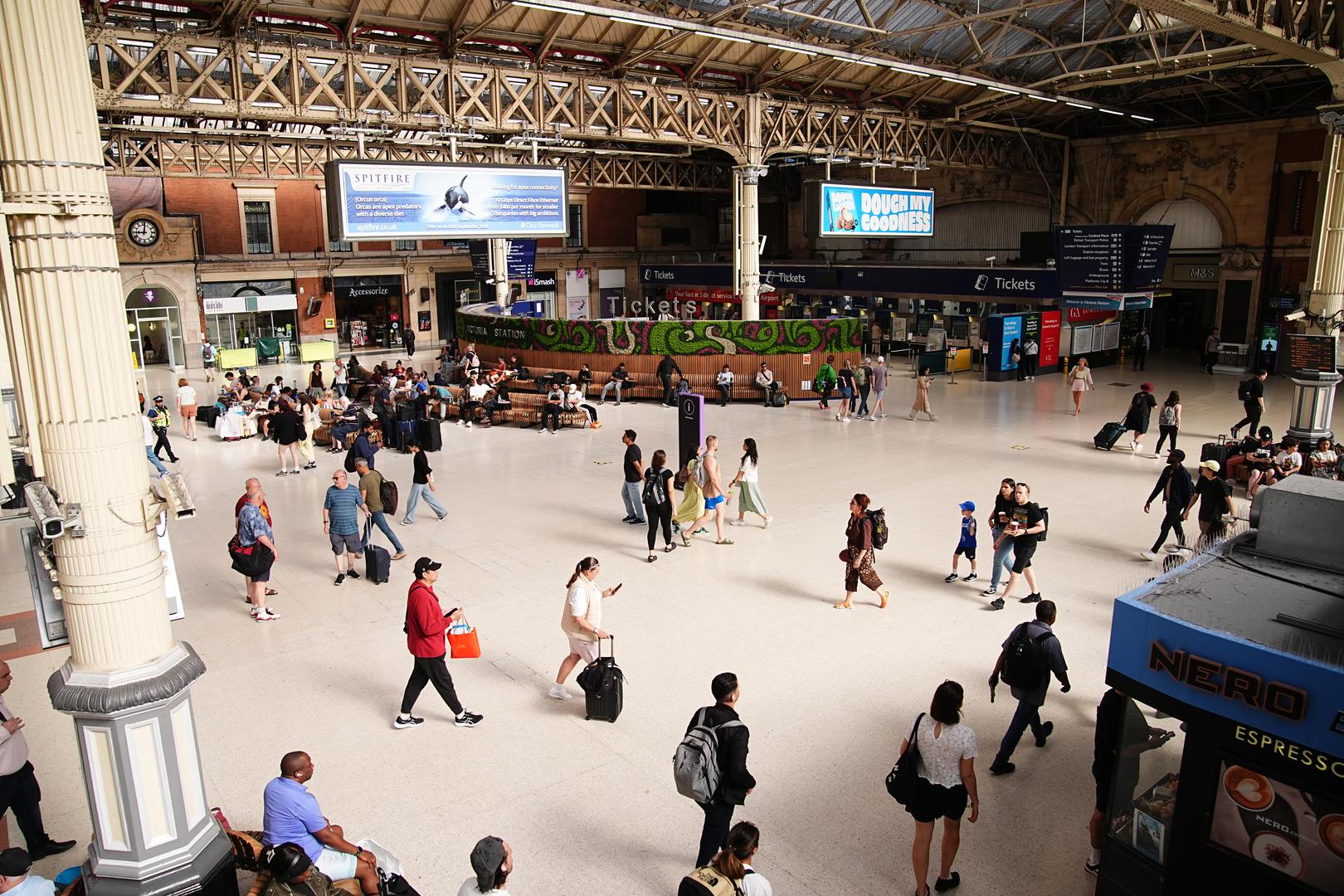 Passengers at Victoria train station, London, amid reports of widespread IT outages affecting airlines, broadcasters and banks. Picture date: Friday July 19, 2024. Photo: Aaron Chown/PRESS ASSOCIATION