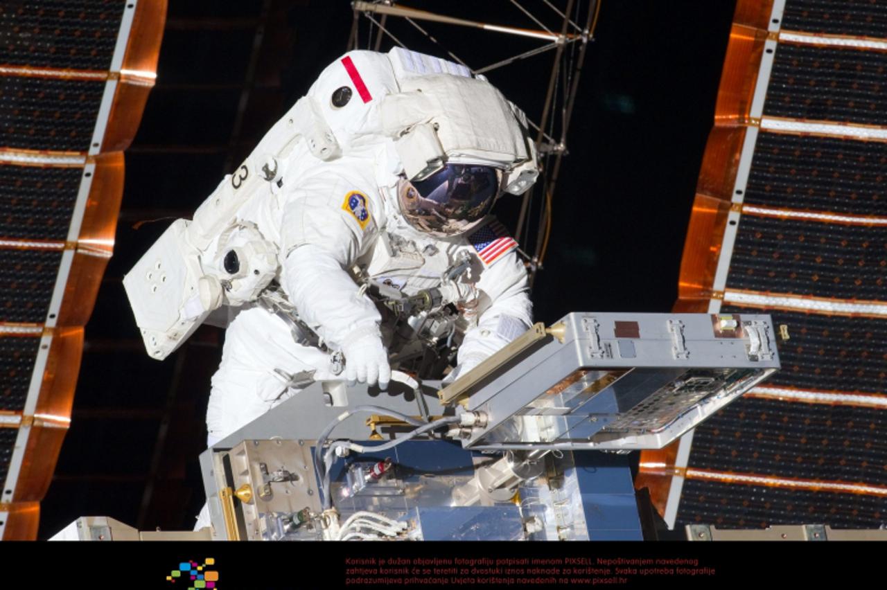 \'WORLD RIGHTS NO USA, FRANCE, AUSTRALIA.   This NASA image shows Astronaut Andrew Feustel during the first of four spacewalks during mission STS-134. Space Shuttle Endeavour and her 13 man crew are o