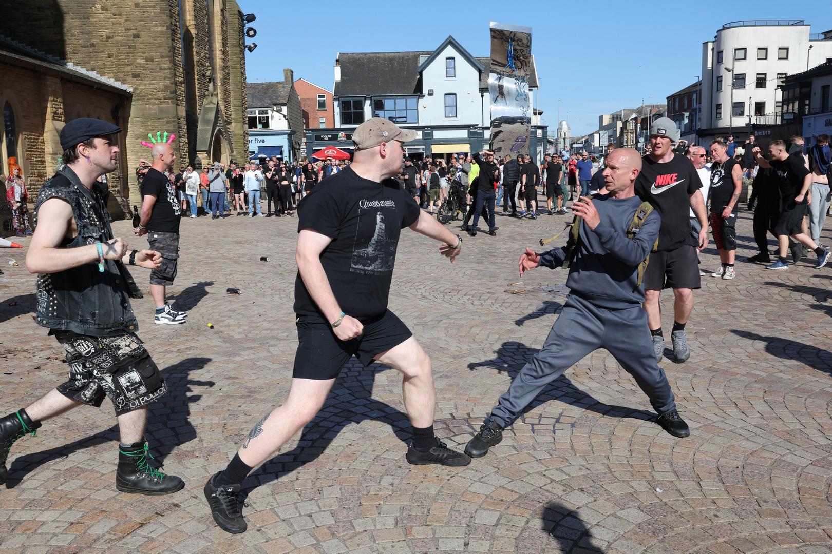 A fight breaks out between anti-fascists (left) and people protesting in Blackpool, following the stabbing attacks on Monday in Southport, in which three young children were killed. Picture date: Saturday August 3, 2024. Photo: Michael Holmes/PRESS ASSOCIATION