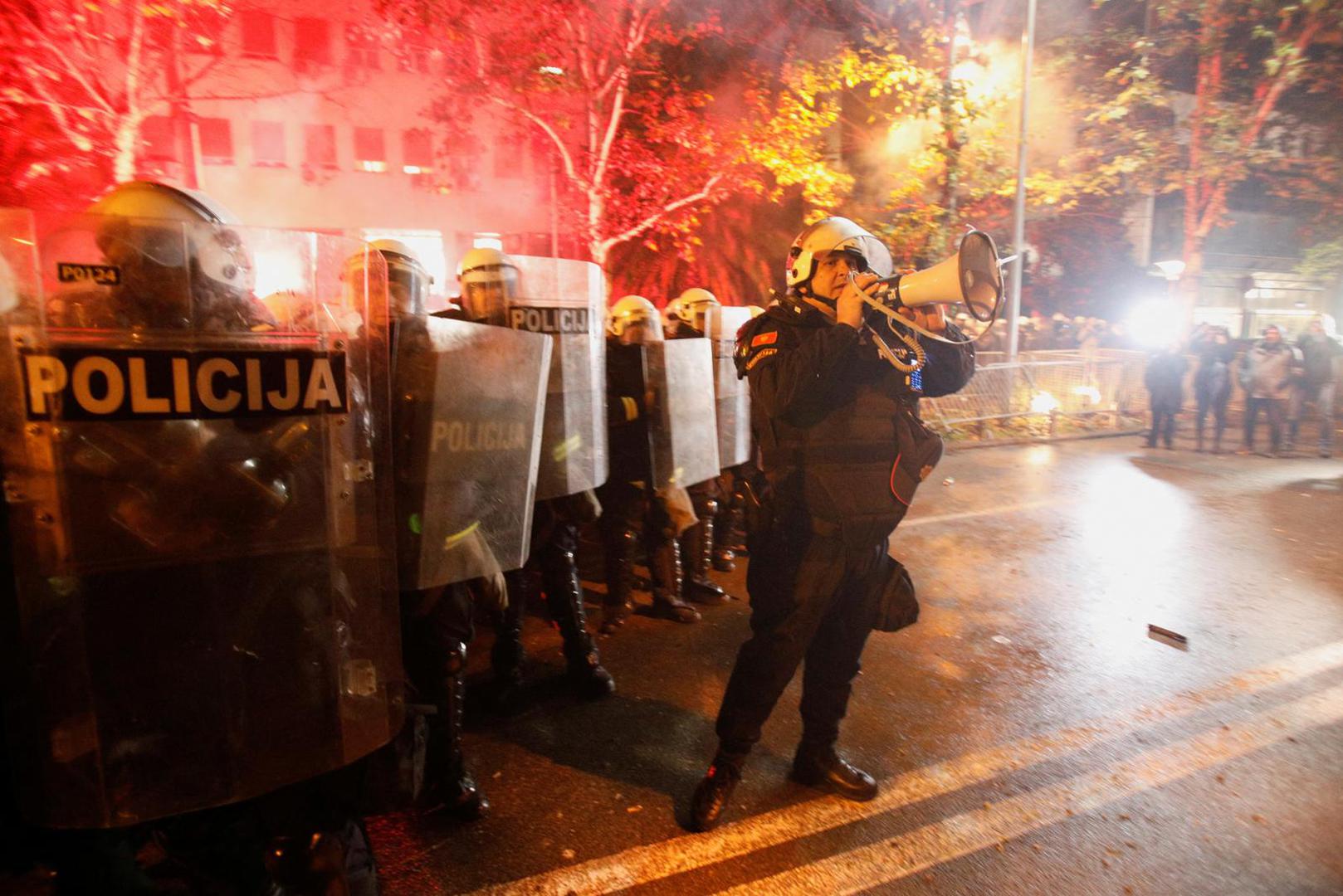 A police commander tells orders to gathered people during a protest against the adoption of a law to limit presidential powers in Podgorica, Montenegro, December 12, 2022. REUTERS/Stevo Vasiljevic Photo: STEVO VASILJEVIC/REUTERS