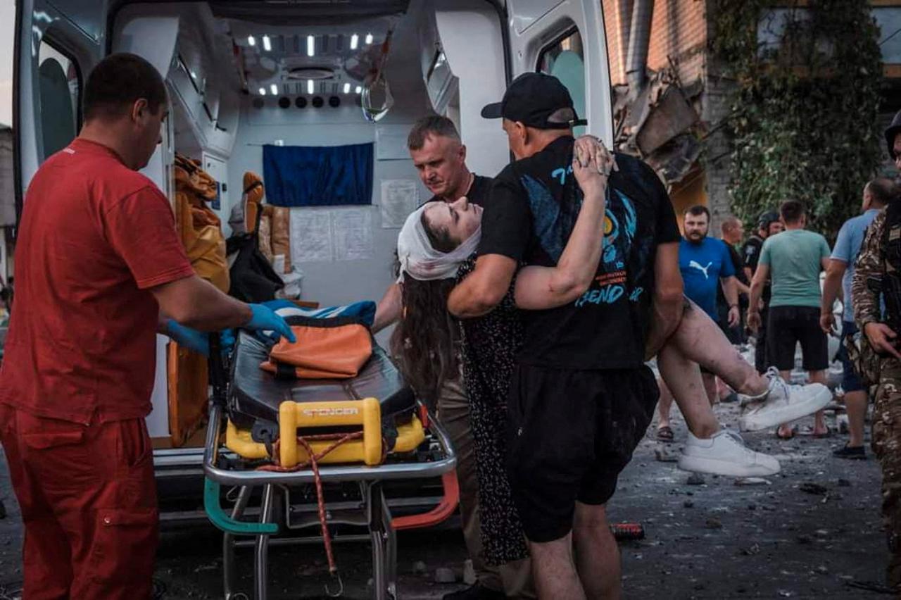 Rescuers work at the site where a building was destroyed during a Russian missile strike, in Pokrovsk