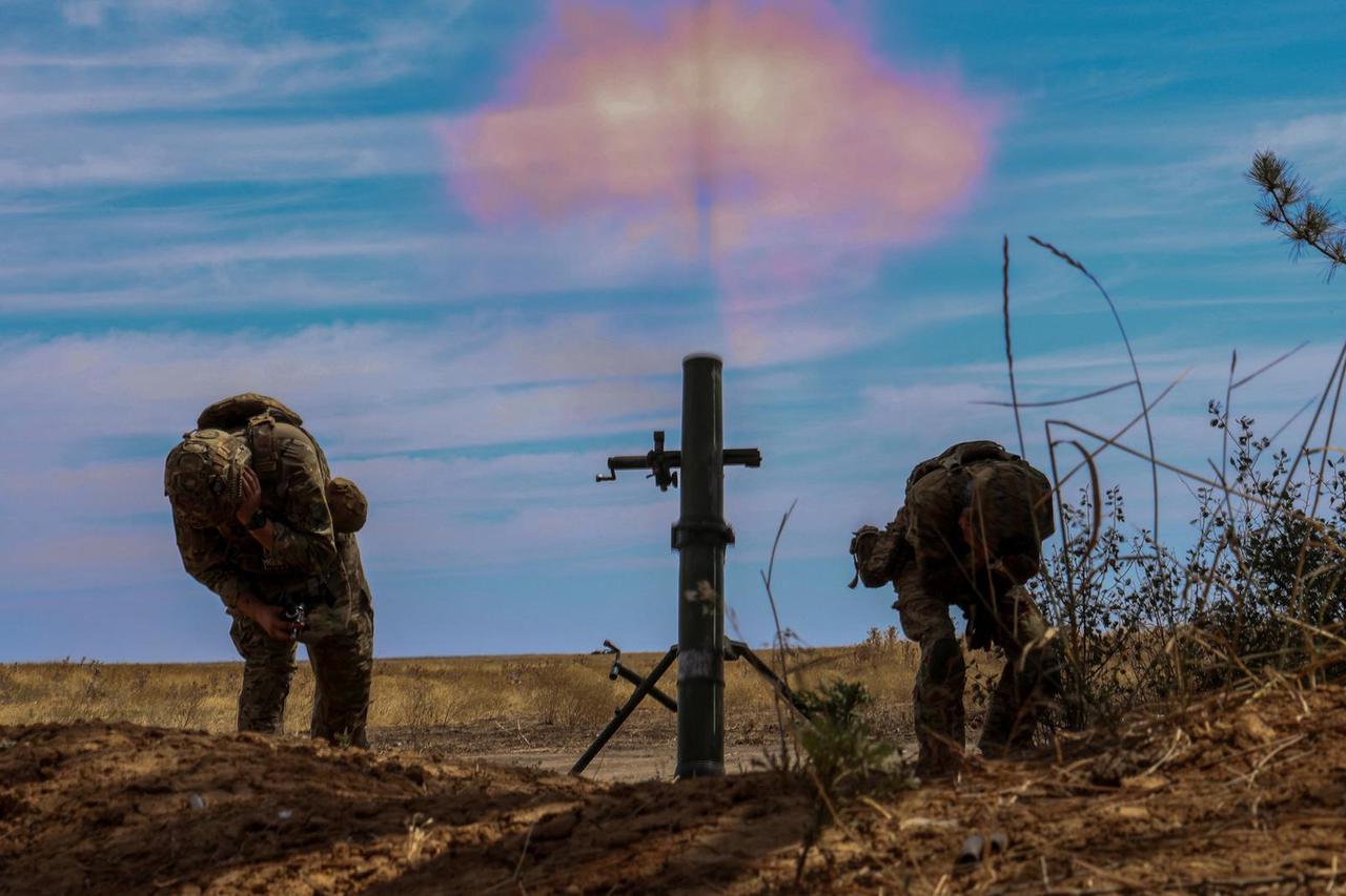 Ukrainian servicemen attend a military exercise in Kherson region