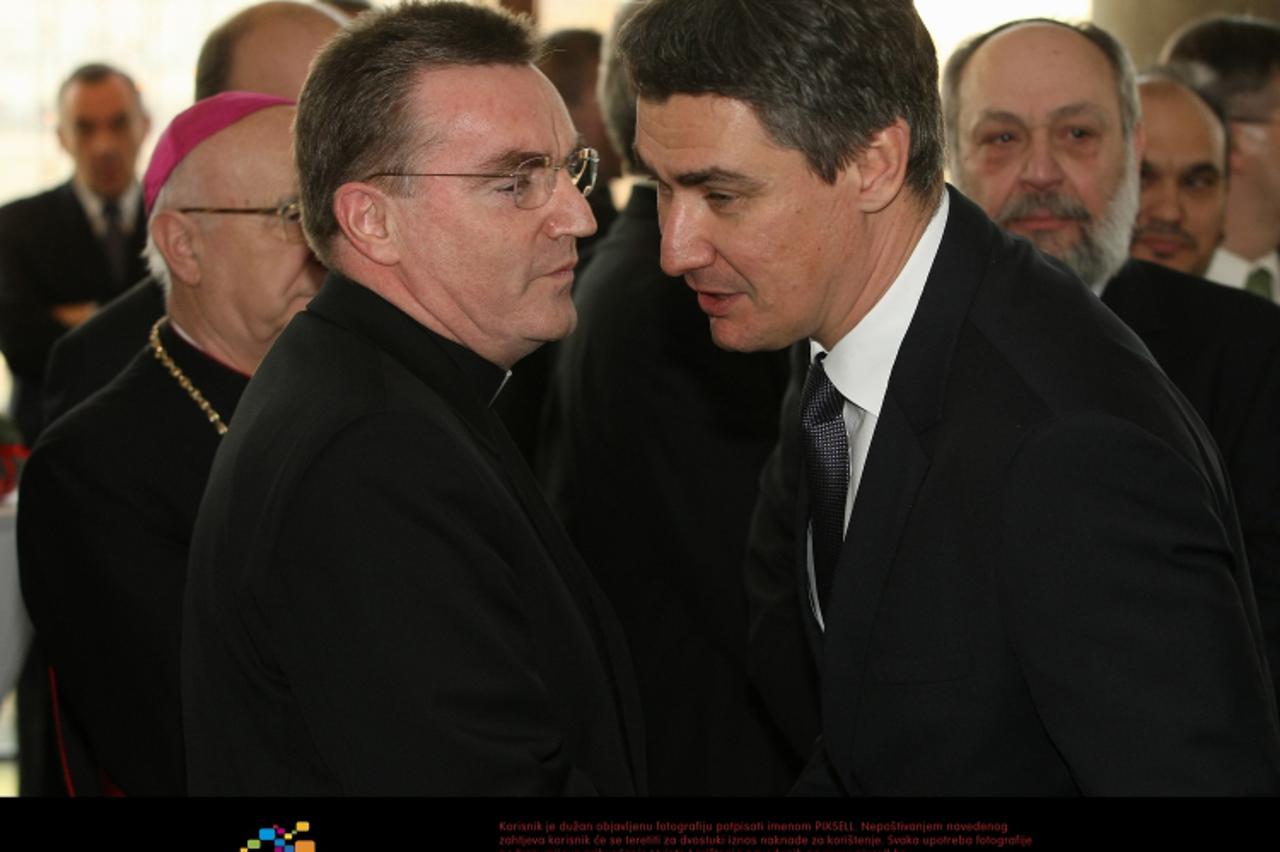 '21.12.2011., Zagreb - Predsjednik Republike Hrvatske odrzao je primanje u prigodi bozicnih i novogodisnjih blagdana u Koncernoj dvorani Vatroslava Lisinskog. Zoran Milanovic i Josip Bozanic.  Photo: 