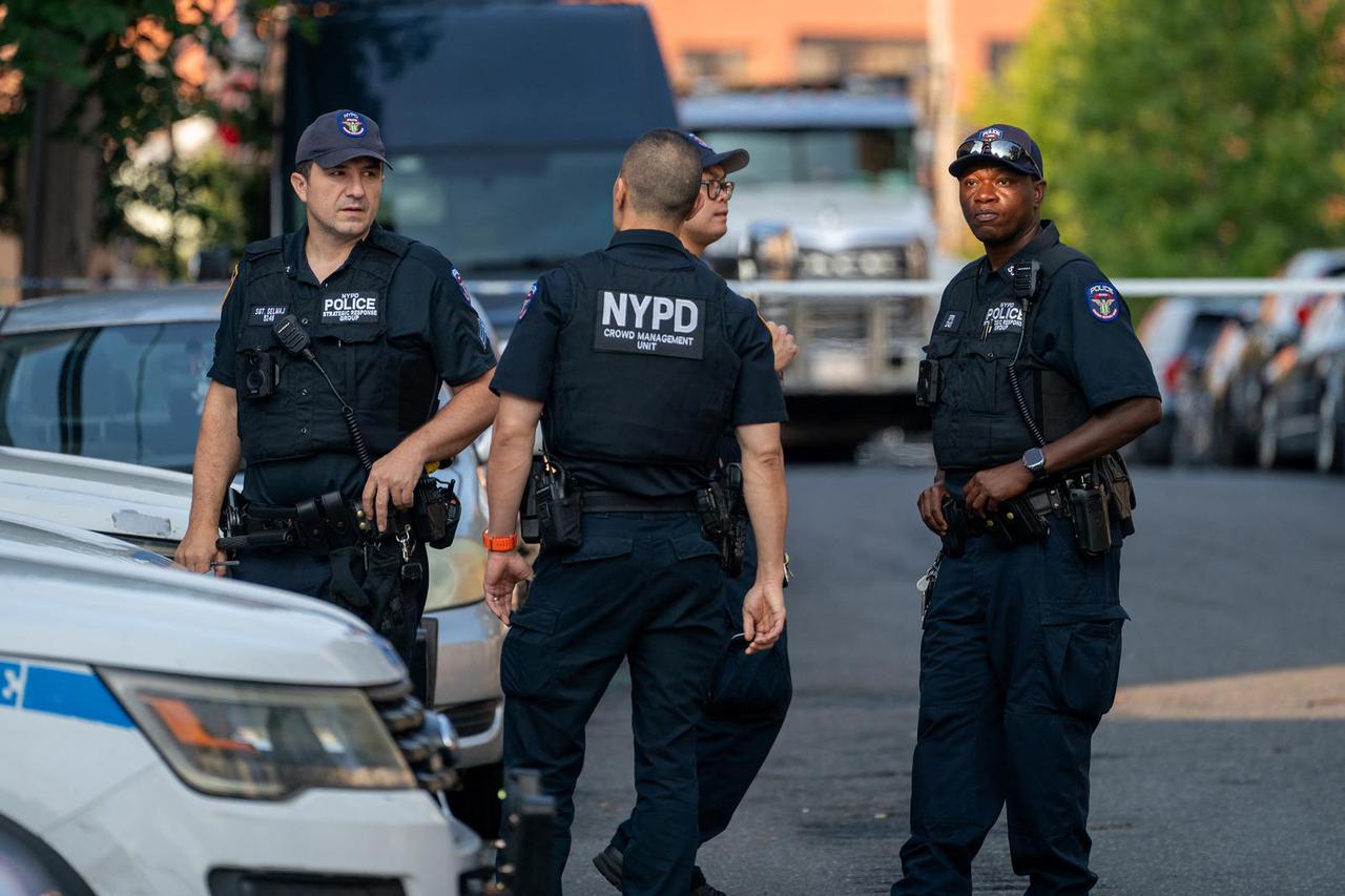 Members of the New York Police Department’s Strategic Response Group work at the site of a drug bust at a warehouse, in New York City