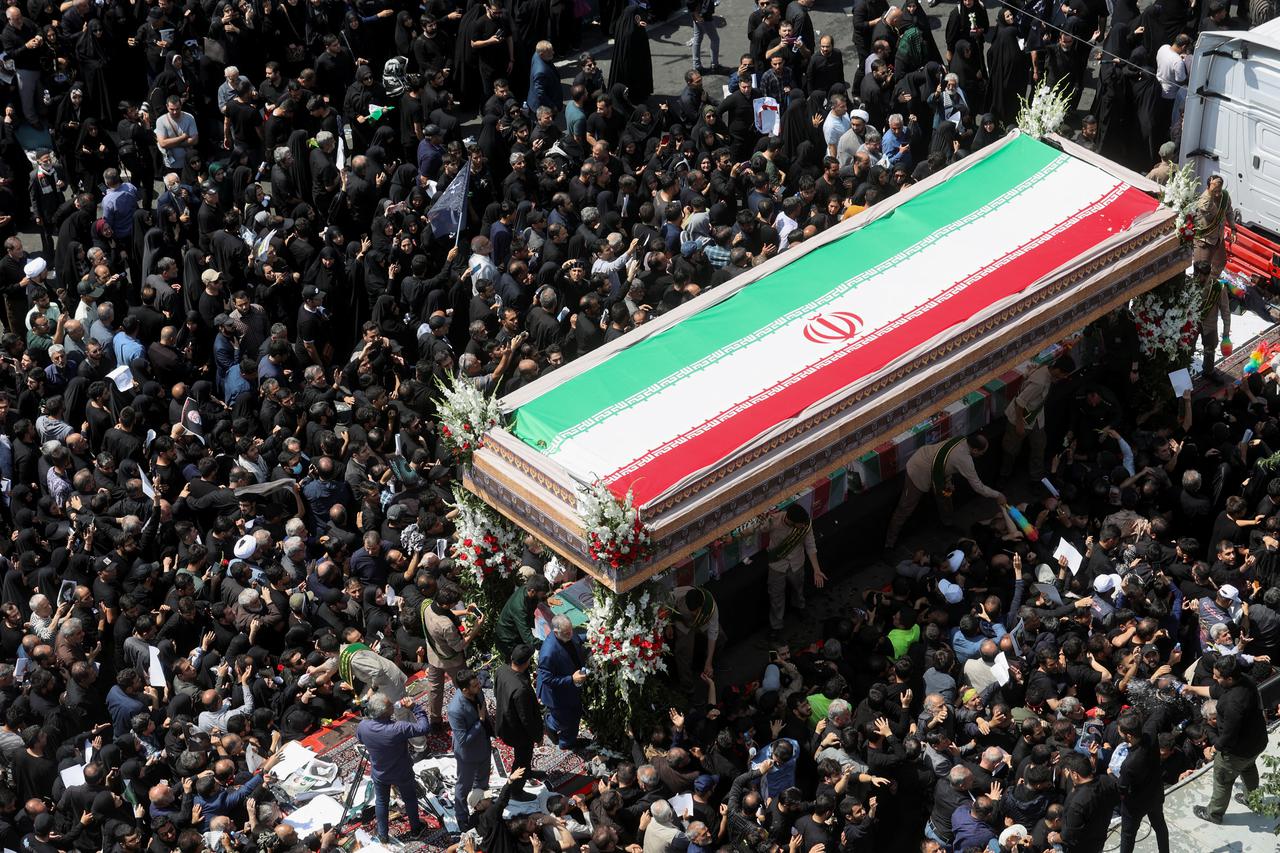 FILE PHOTO: Rescue team works following a crash of a helicopter carrying Iran's President Ebrahim Raisi, in Varzaqan