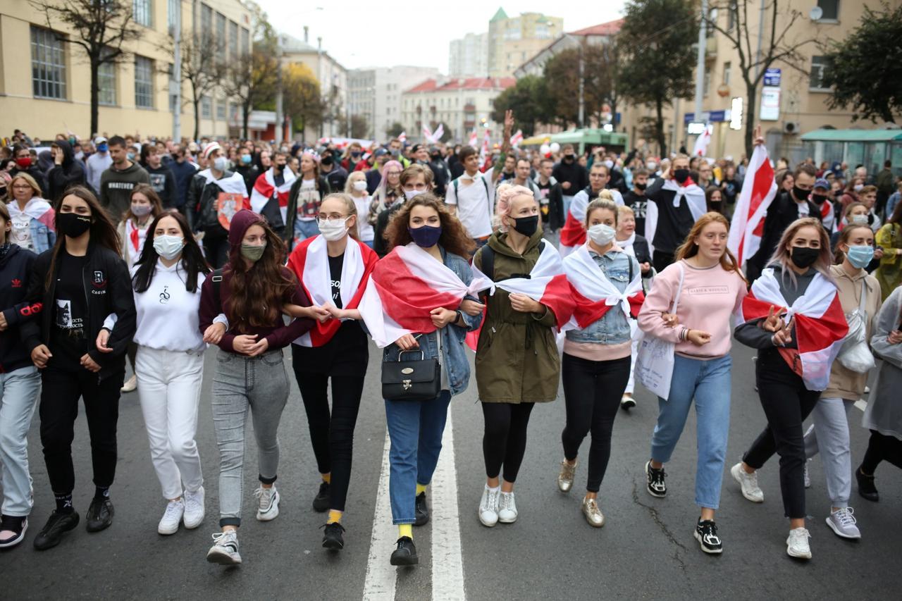 Belarusian opposition supporters hold a rally in Minsk