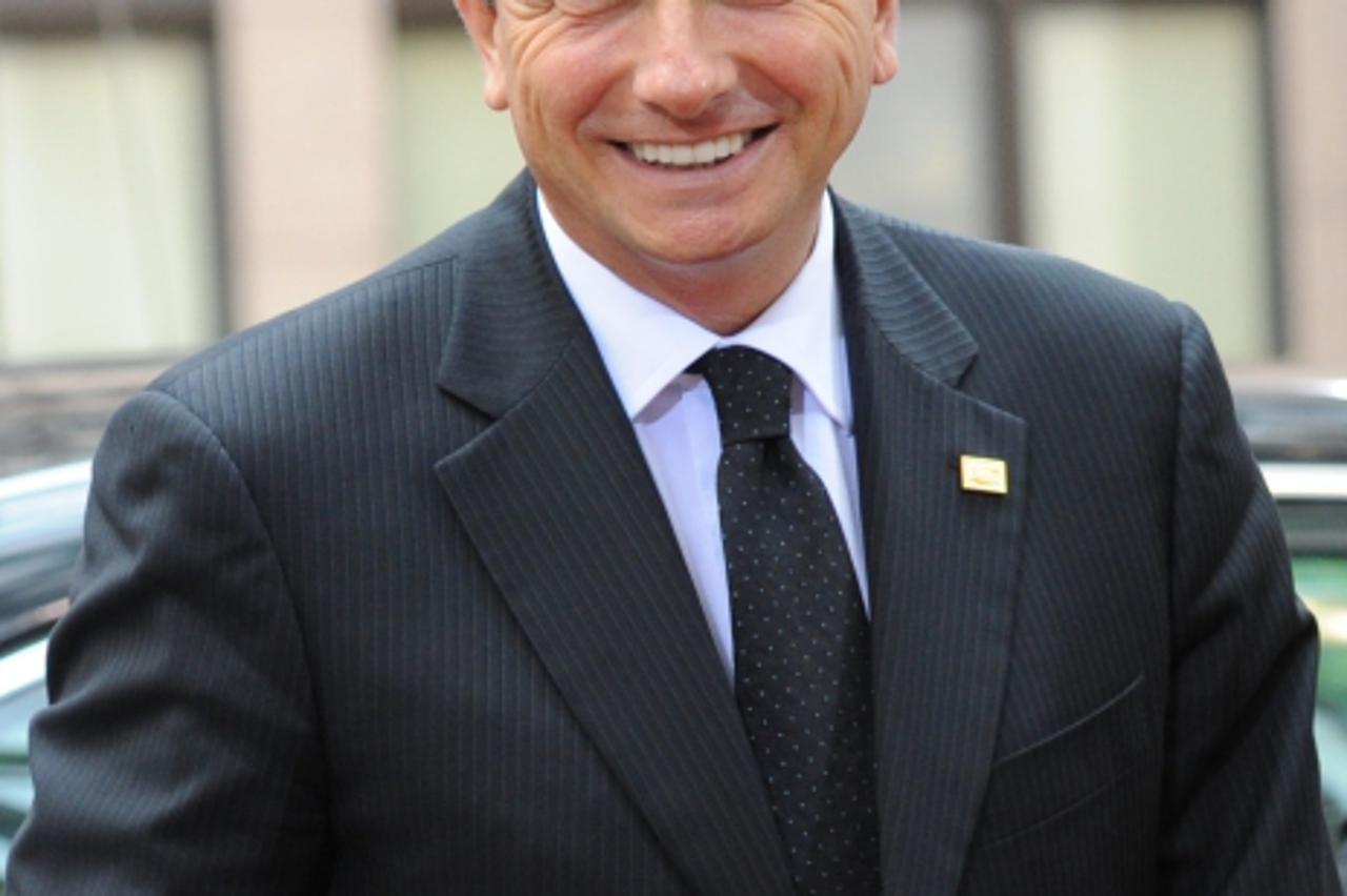 'Slovenian Prime Minister Borut Pahor arrives prior to an EU summit, on March 24, 2011 at the European Council headquarters in Brussels. Europe\'s leaders head into a crucial summit, torn over the mil