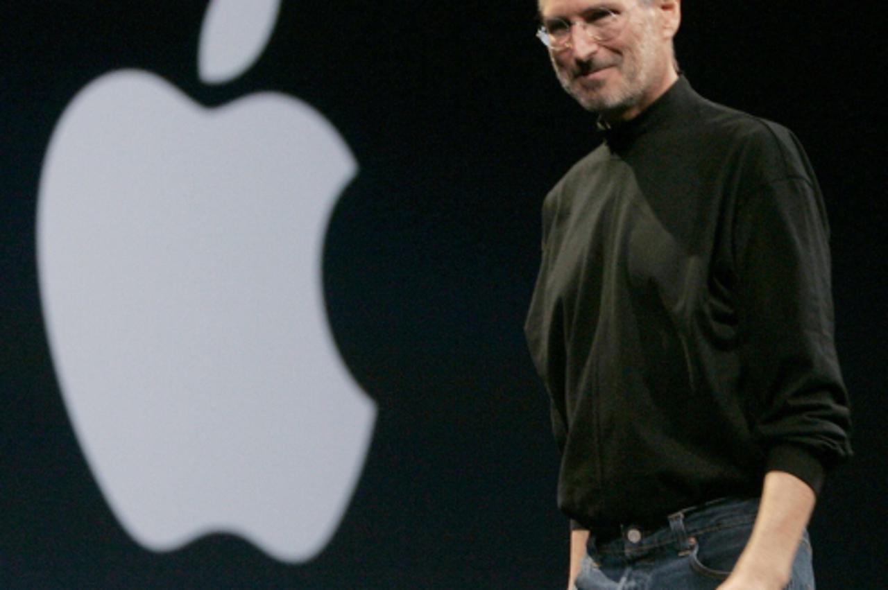 'Apple CEO Steve Jobs smiles during the Macworld Convention and Expo in San Francisco, California in this January 15, 2008 file photo. Apple Inc co-founder and former CEO Steve Jobs, counted among the