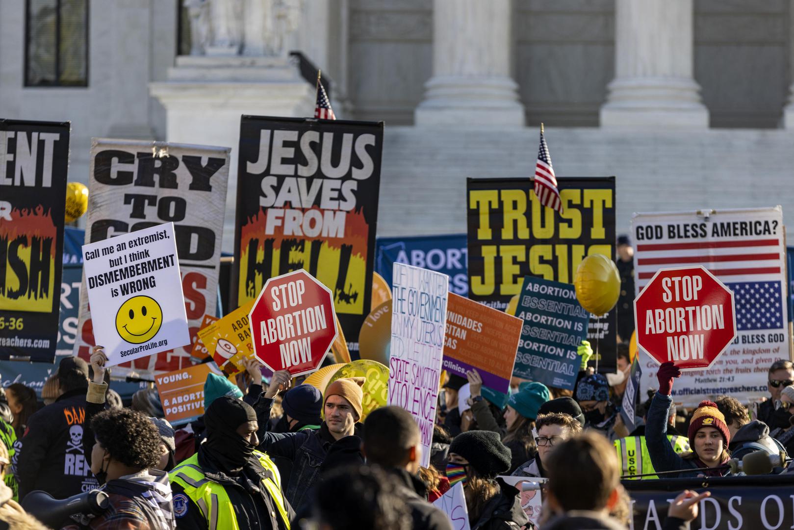 Protesters gather at the Supreme Court in Washington, D.C. on Wednesday, December 1, 2021. The court heard today the case Dobbs v. Jackson Women's Health Organization on the Mississippi law that bans nearly all abortions after 15 weeks. It is expected to be a direct challenge to the 1973 decision to  Roe v. Wade landmark case.    Photo by Tasos Katopodis/UPI . Photo via Newscom