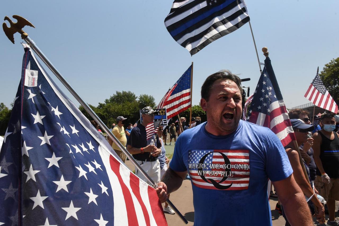 People participate in a "Back the Blue" rally