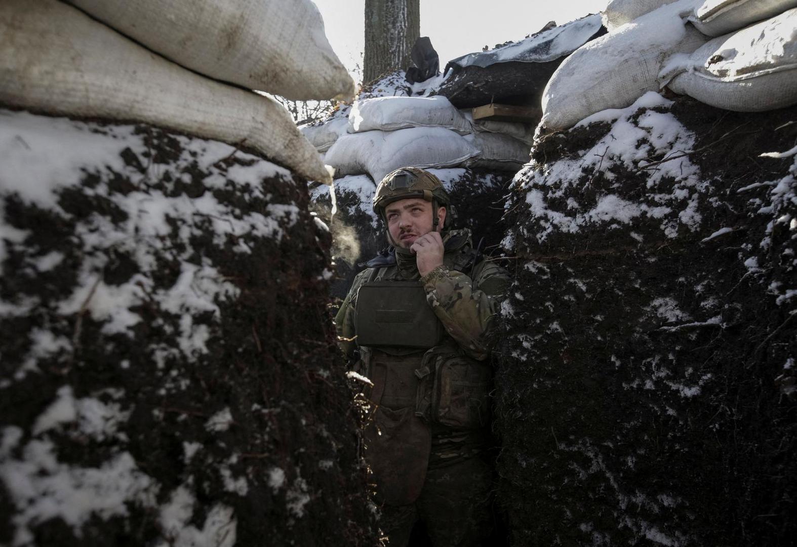 A Ukrainian serviceman stands in a trench at a frontline, amid Russia's attack on Ukraine, in Donetsk region, Ukraine January 7, 2023.  REUTERS/Anna Kudriavtseva     TPX IMAGES OF THE DAY Photo: Stringer/REUTERS