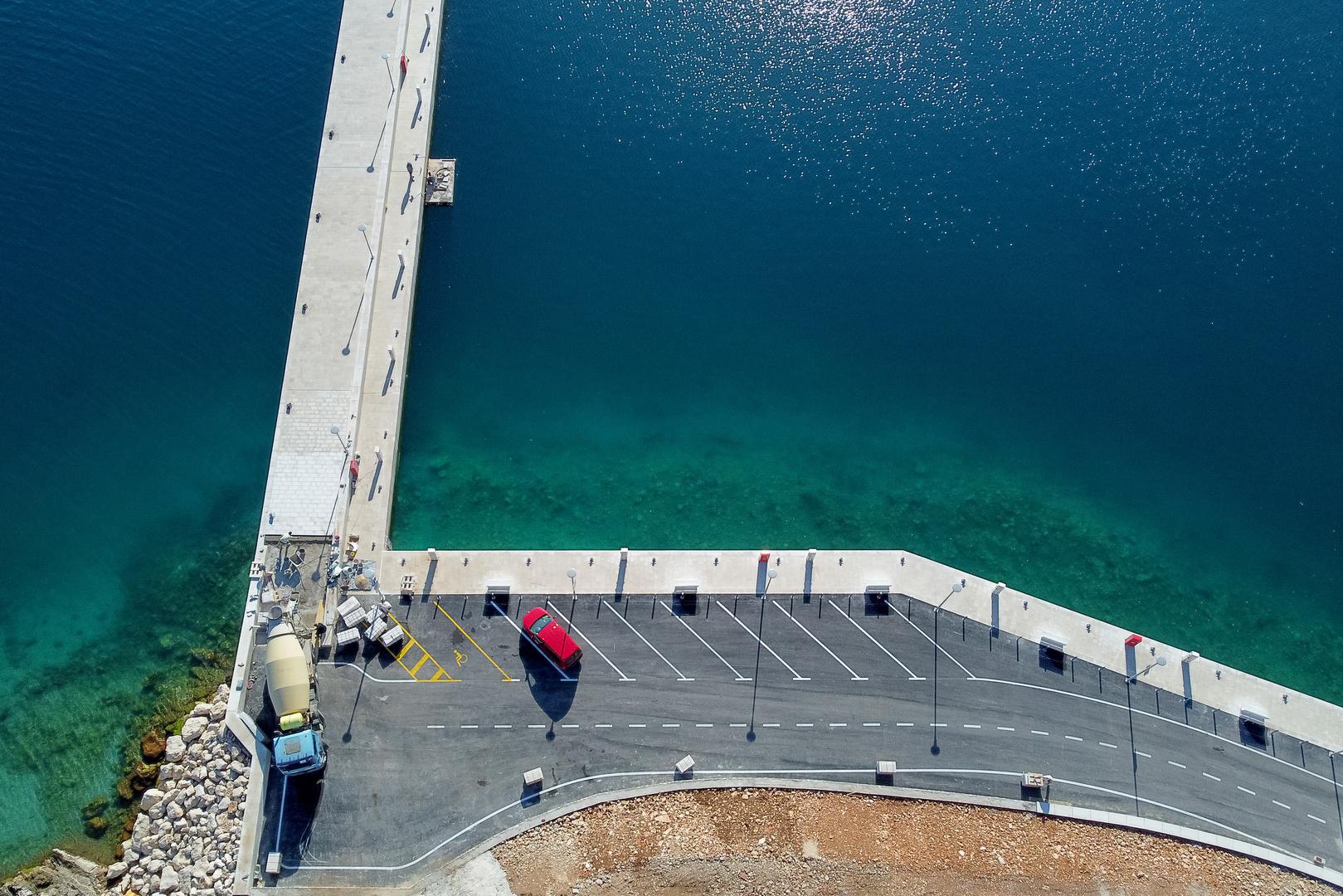 26.01.2024., Sali - Pogled iz zraka na novu luku Sali sa 116 m dugim lukobranom i 150 m nove obale Photo: Sime Zelic/PIXSELL