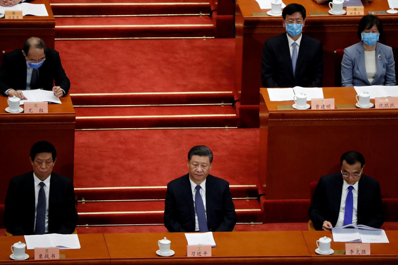 Chinese President Xi Jinping and officials attend for the opening session of CPPCC in Beijing