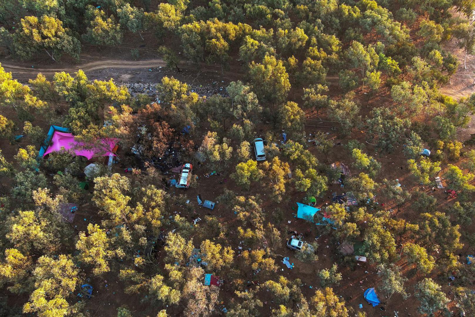 An aerial view shows personal belongings of festival-goers at the site of an attack on the Nova Festival by Hamas gunmen from Gaza, near Israel's border with the Gaza Strip, in southern Israel, October 12, 2023. REUTERS/Ilan Rosenberg Photo: ILAN ROSENBERG/REUTERS