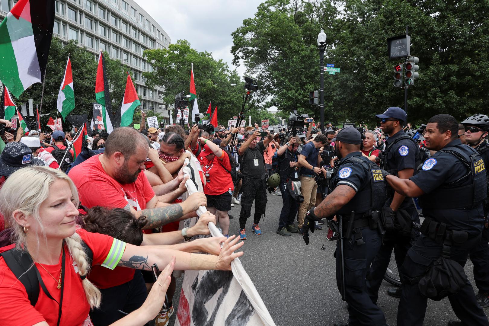 Pro-Palestinian demonstrators react from pepper spray deployed by U.S. Capitol Police, on the day Israeli Prime Minister Benjamin Netanyahu addresses a joint meeting of Congress, on Capitol Hill, in Washington, U.S., July 24, 2024. REUTERS/Umit Bektas Photo: UMIT BEKTAS/REUTERS