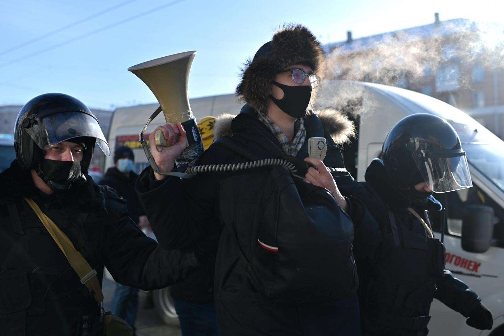 Rally in support of Alexei Navalny in Omsk Law enforcement officers detain a participant during a rally in support of jailed Russian opposition leader Alexei Navalny in Omsk, Russia January 31, 2021. REUTERS/Alexey Malgavko ALEXEY MALGAVKO