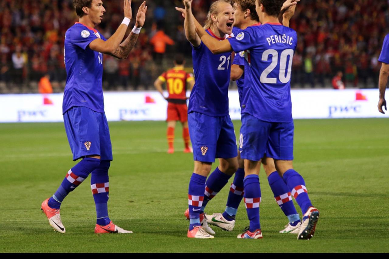 '11.09.2012., Stadion Kralj Baudouin, Bruxelles, Belgija - Kvalifikacije za Svjetsko nogometno prvenstvo 2014., skupina A, 2. kolo, Belgija - Hrvatska. Mario Mandzukic, Domagoj Vida, Ivan Persic.  Pho