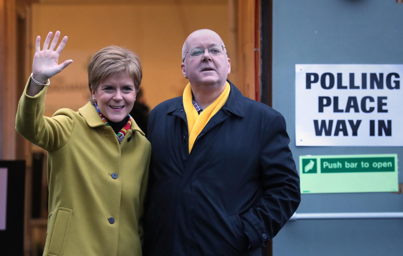 File photo dated 12/12/19 of the then SNP leader Nicola Sturgeon with husband Peter Murrell casting their votes in the 2019 General Election at Broomhouse Park Community Hall in Glasgow. Former SNP chief executive Peter Murrell, the husband of Nicola Sturgeon, is understood to have been arrested by Police Scotland over an investigation into the party's finances. Detectives are said to have questioned him and searches have been carried out at a number of properties. Issue date: Wednesday April 5, 2023. Photo: Andrew Milligan/PRESS ASSOCIATION