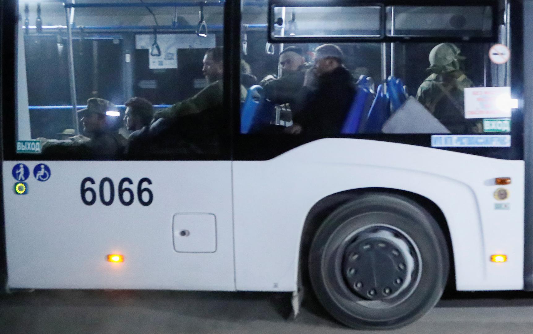 A bus carrying service members of Ukrainian forces from the besieged Azovstal steel mill drives away under escort of the pro-Russian military in the course of Ukraine-Russia conflict in Mariupol, Ukraine May 16, 2022. REUTERS/Alexander Ermochenko Photo: Alexander Ermochenko/REUTERS