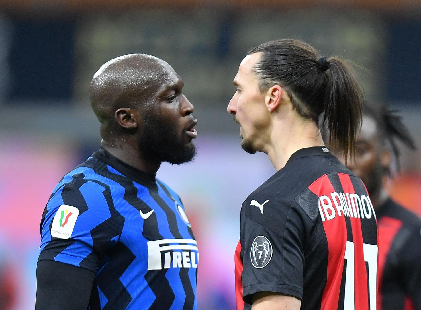 Coppa Italia - Quarter Final - Inter Milan v AC Milan Soccer Football - Coppa Italia - Quarter Final - Inter Milan v AC Milan - San Siro, Milan, Italy - January 26, 2021 AC Milan's Zlatan Ibrahimovic clashes with Inter Milan's Romelu Lukaku REUTERS/Daniele Mascolo DANIELE MASCOLO