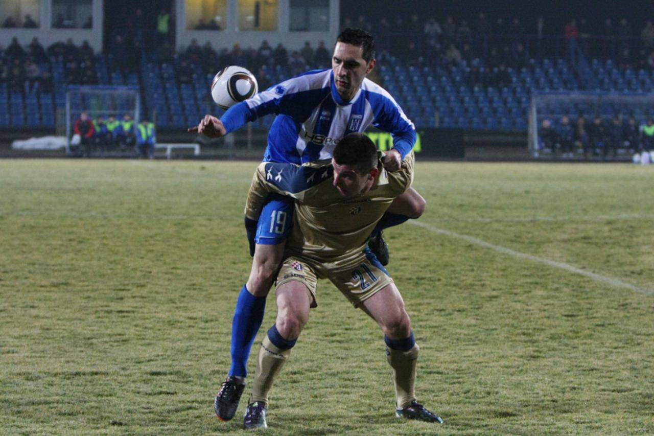 \'26.02.2011., Karlovac - Nogometna utakmica 19. kola Prve HNL izmedju NK Karlovac i NK Dinamo.Marijan Budimir(19)Fatos Beqiraj(21) Photo: Kristina Stedul Fabac/PIXSELL\'