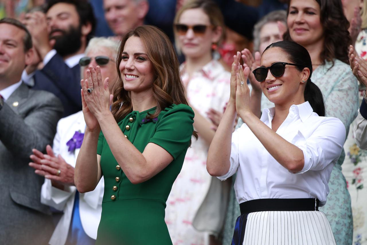 Kate Middleton, the Duchess of Cambridge, Meghan Markle, the Duchess of Sussex and Pippa MIddleton watch the Ladies Singles Final between Serena Williams and Simona Halep at The Wimbledon Championships tennis, Wimbledon, London on July 13, 2019