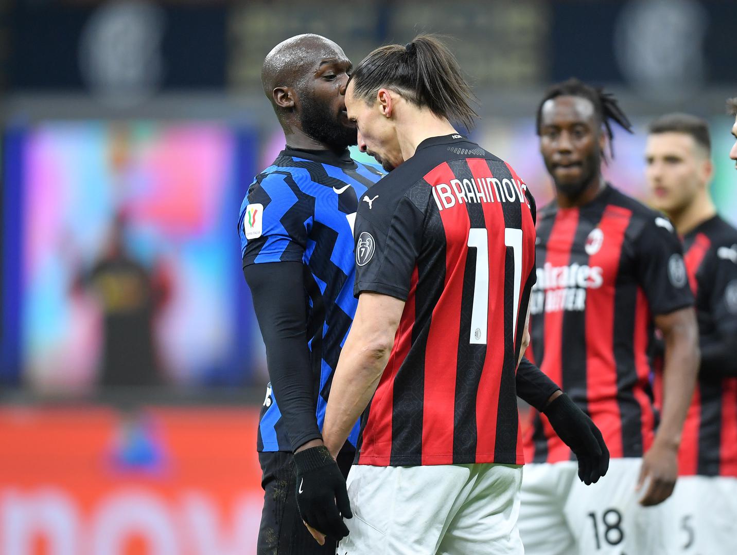 Coppa Italia - Quarter Final - Inter Milan v AC Milan Soccer Football - Coppa Italia - Quarter Final - Inter Milan v AC Milan - San Siro, Milan, Italy - January 26, 2021 AC Milan's Zlatan Ibrahimovic clashes with Inter Milan's Romelu Lukaku REUTERS/Daniele Mascolo DANIELE MASCOLO