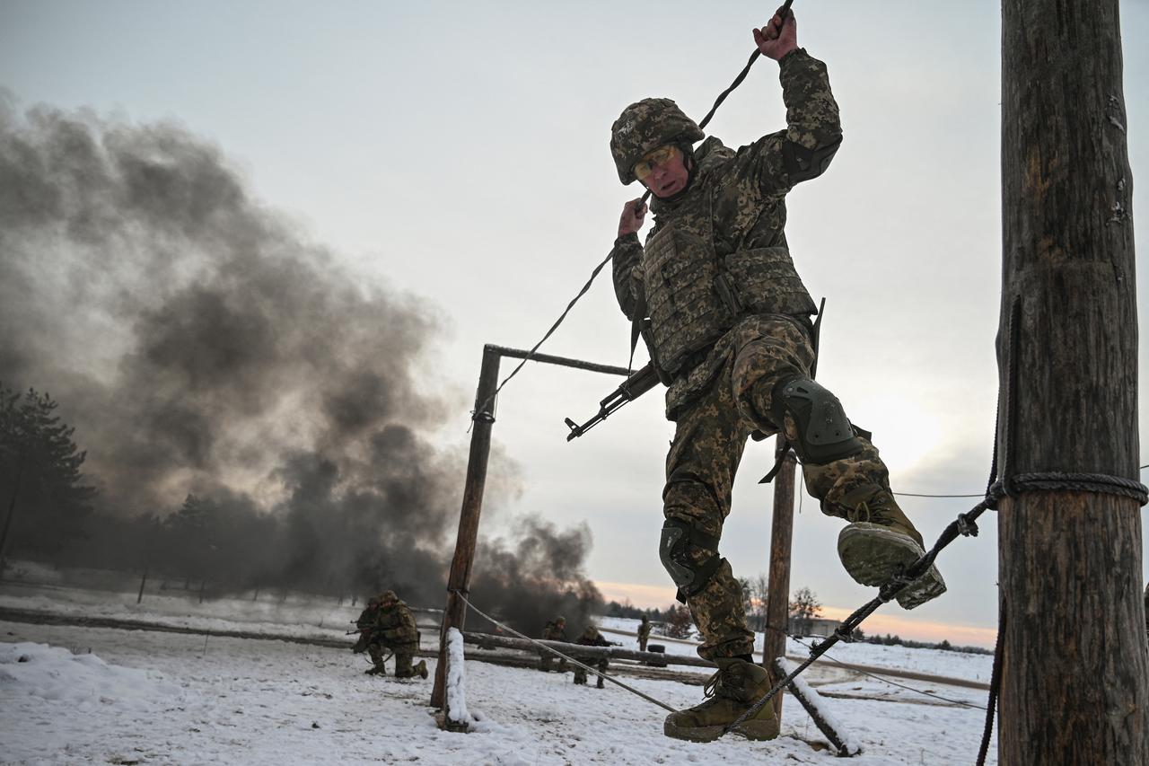 Ukrainian service members attend military exercises in Chernihiv region